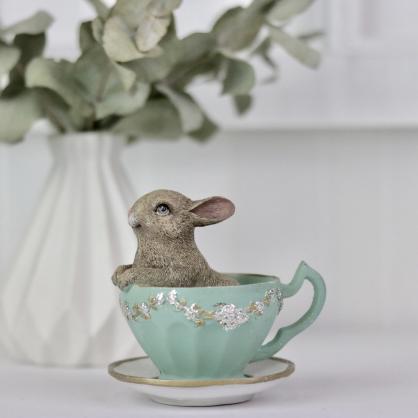 Pskdekoration Kaninunge i kaffekopp - sittande , hemmetshjarta.se