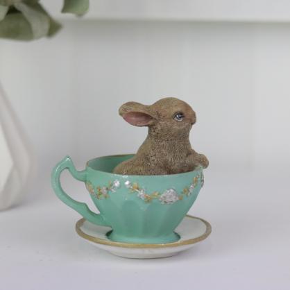 Pskdekoration Kaninunge i kaffekopp - sittande , hemmetshjarta.se